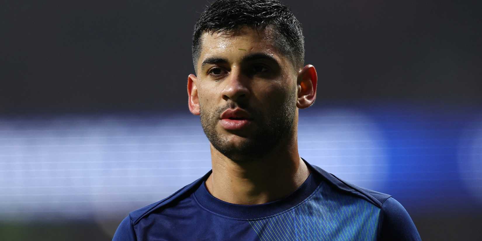 Tottenham Hotspur Cristian Romero warms up