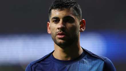 Tottenham Hotspur Cristian Romero warms up