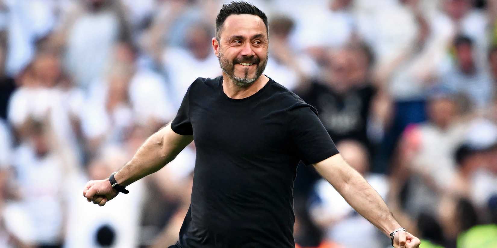 Roebrto De Zerbi celebrates Spurs' win over Everton