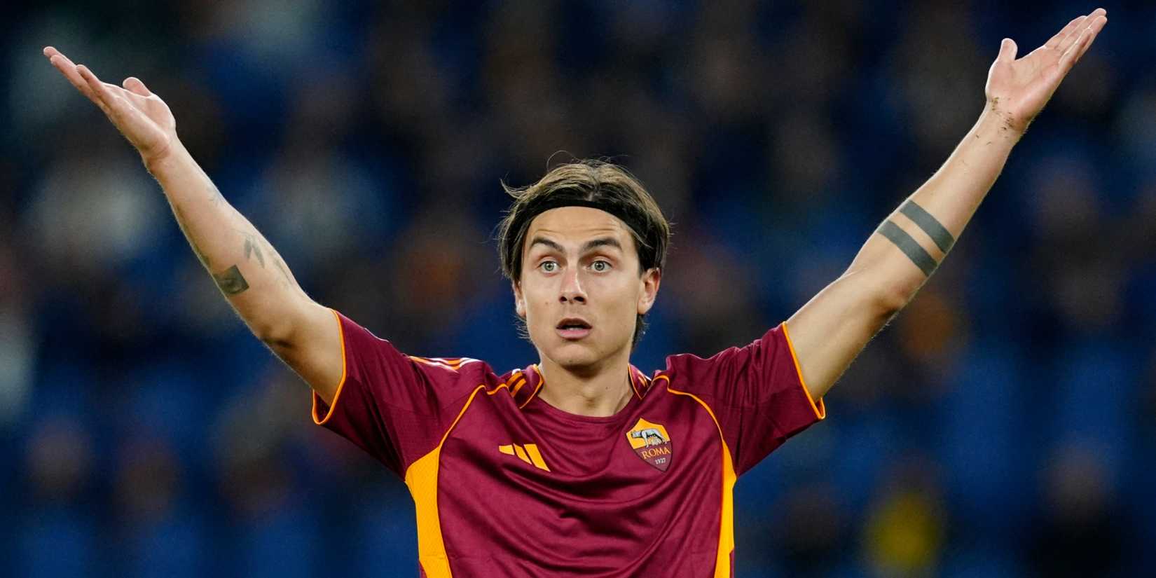 AS Roma's Paulo Dybala reacts with tattoo shown on arm