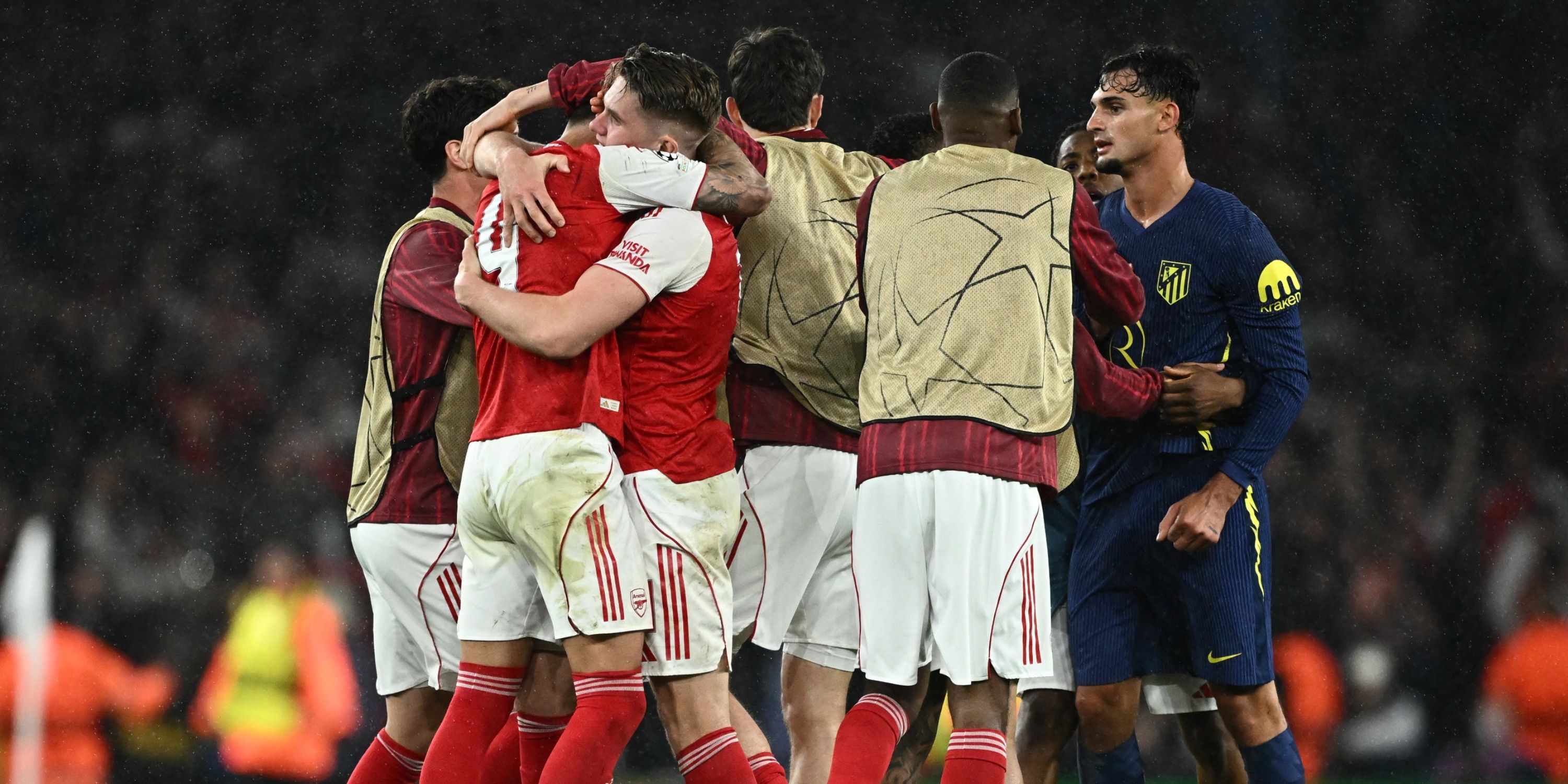 Arsenal players celebrate after beating Atletico