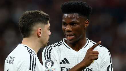 Real Madrid's Federico Valverde and Aurelien Tchouameni talking