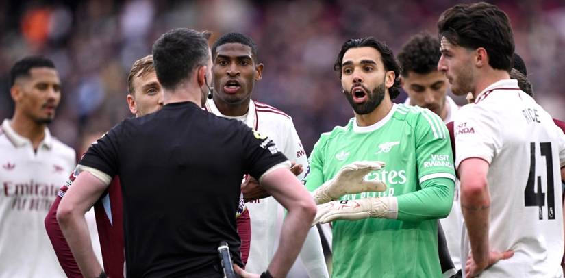 Arsenal and West Ham players during VAR review