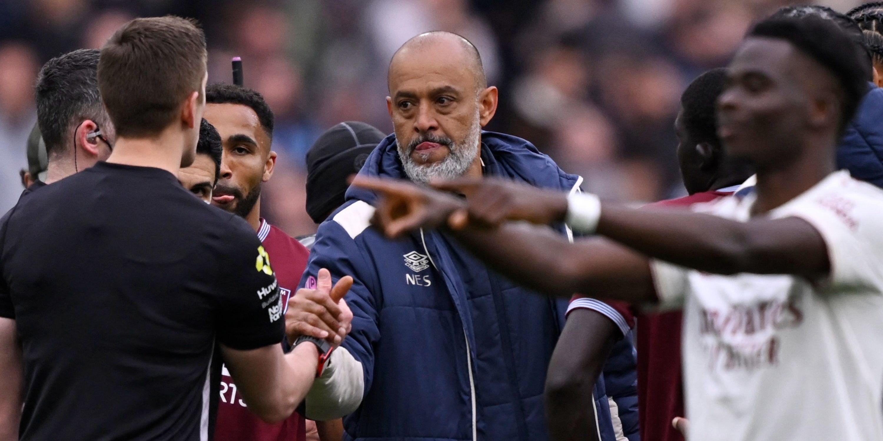 Referee Chris Kavanagh shakes hands with West Ham United manager Nuno Espirito Santo after the Arsenal match
