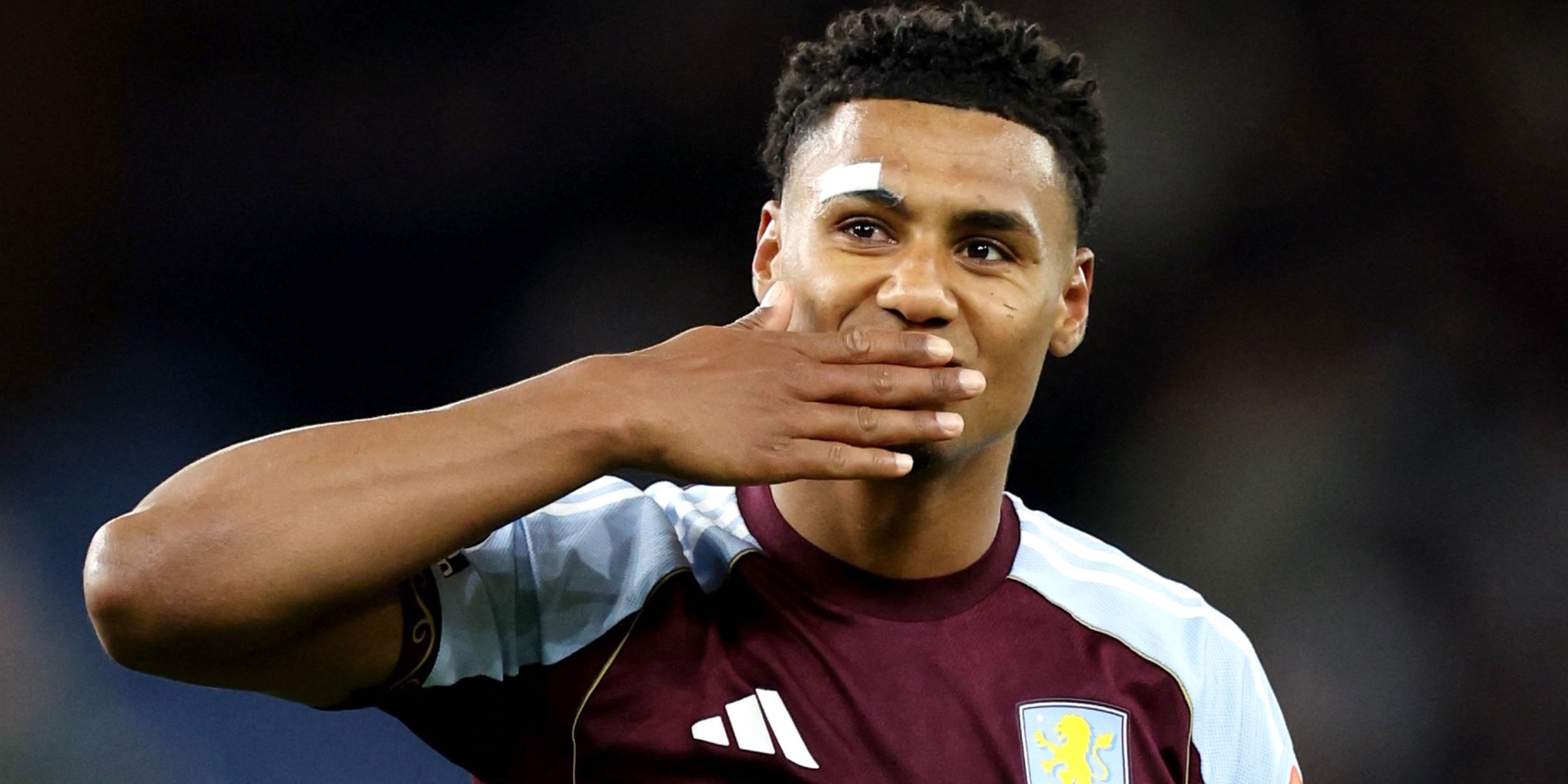 Ollie Watkins celebrates against Liverpool