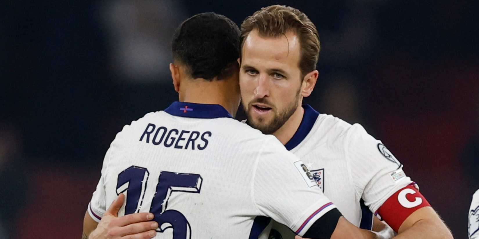 Harry Kane and Morgan Rogers hug during an England game
