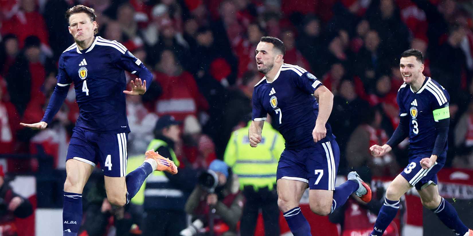 Scotland players celebrate securing World Cup qualification