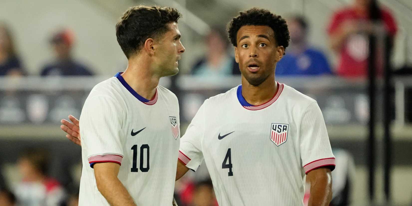 Christian Pulisic and Tyler Adams playing for the USMNT