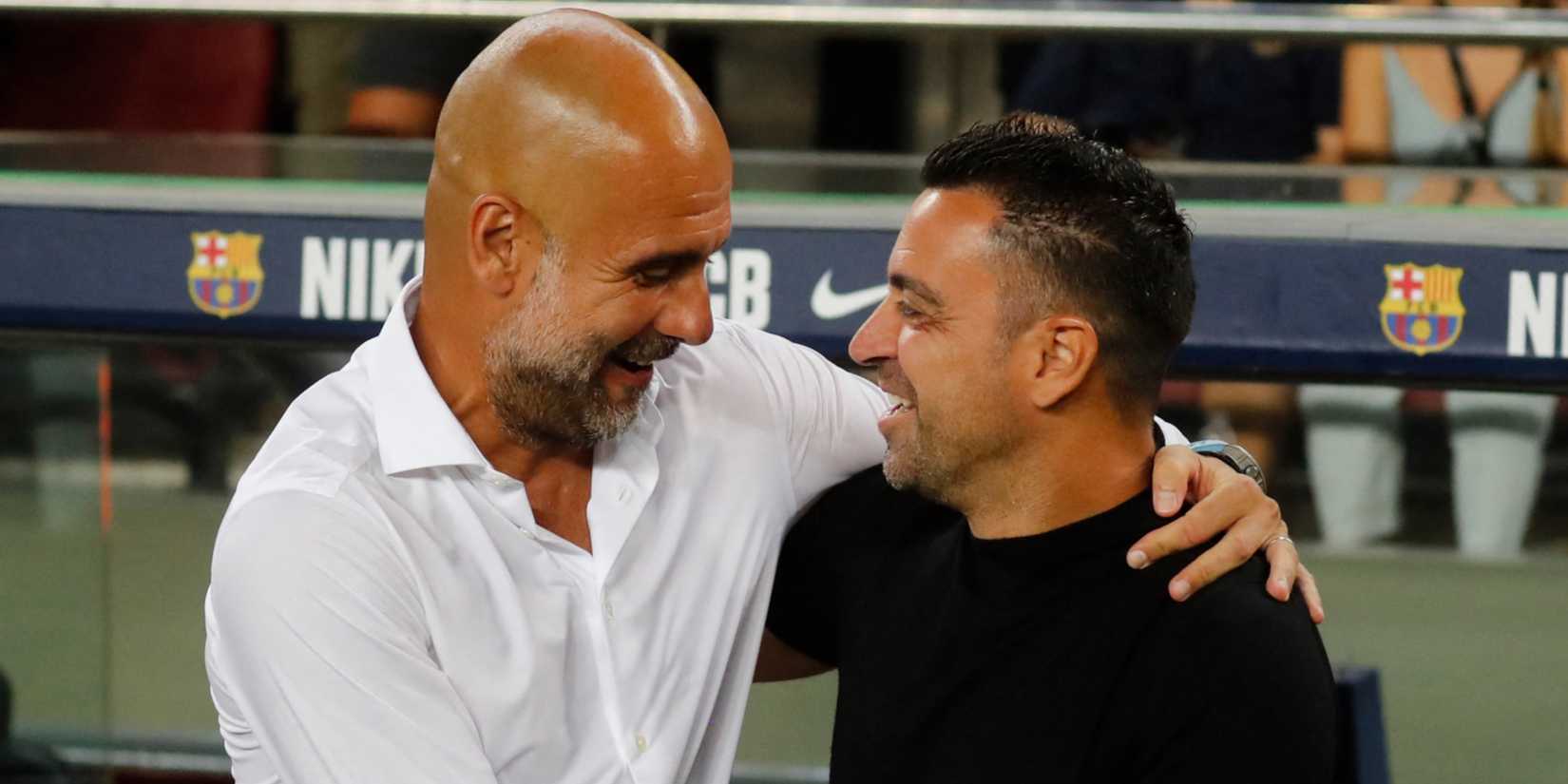 Pep Guardiola with Xavi