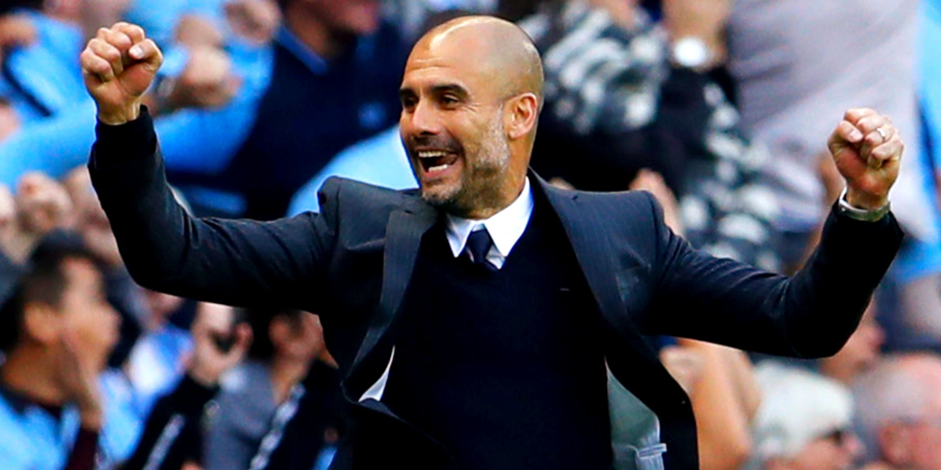 Pep Guardiola celebrating at his first Man City match