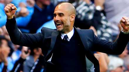 Pep Guardiola celebrating at his first Man City match