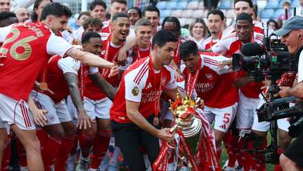 Arsenal Players and Mikel Arteta With the Premier League Trophy