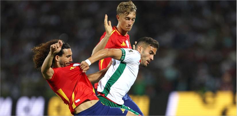 Dean Huijsen and Marc Cucurella battle for the ball