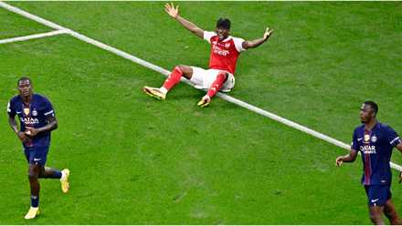 Noni Madueke appeals for a penalty in Arsenal's match with PSG