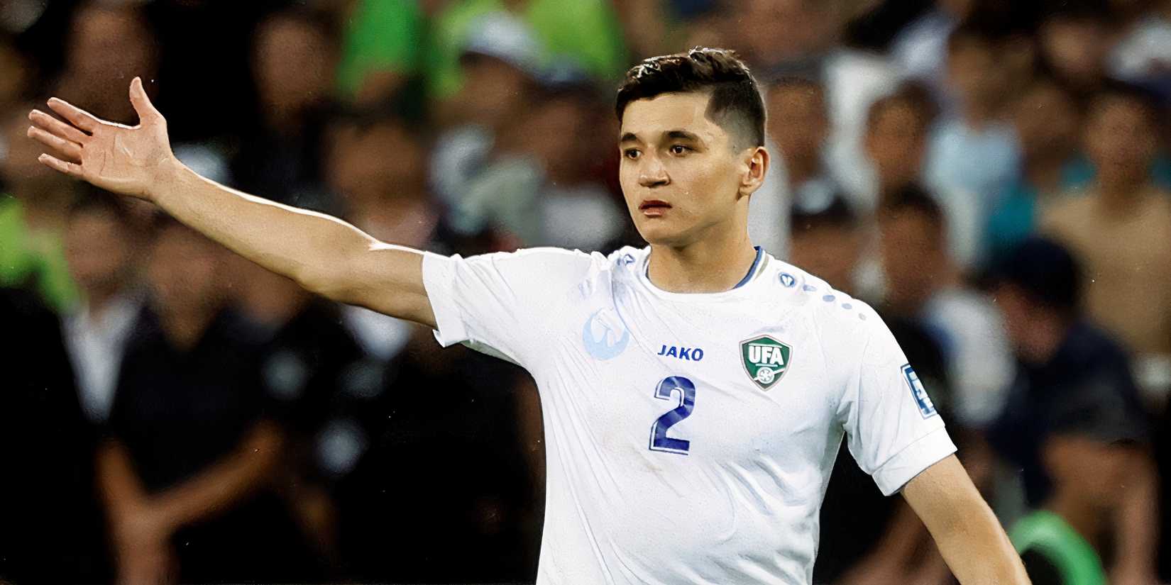 Abdukodir Khusanov in action during an Uzbekistan match