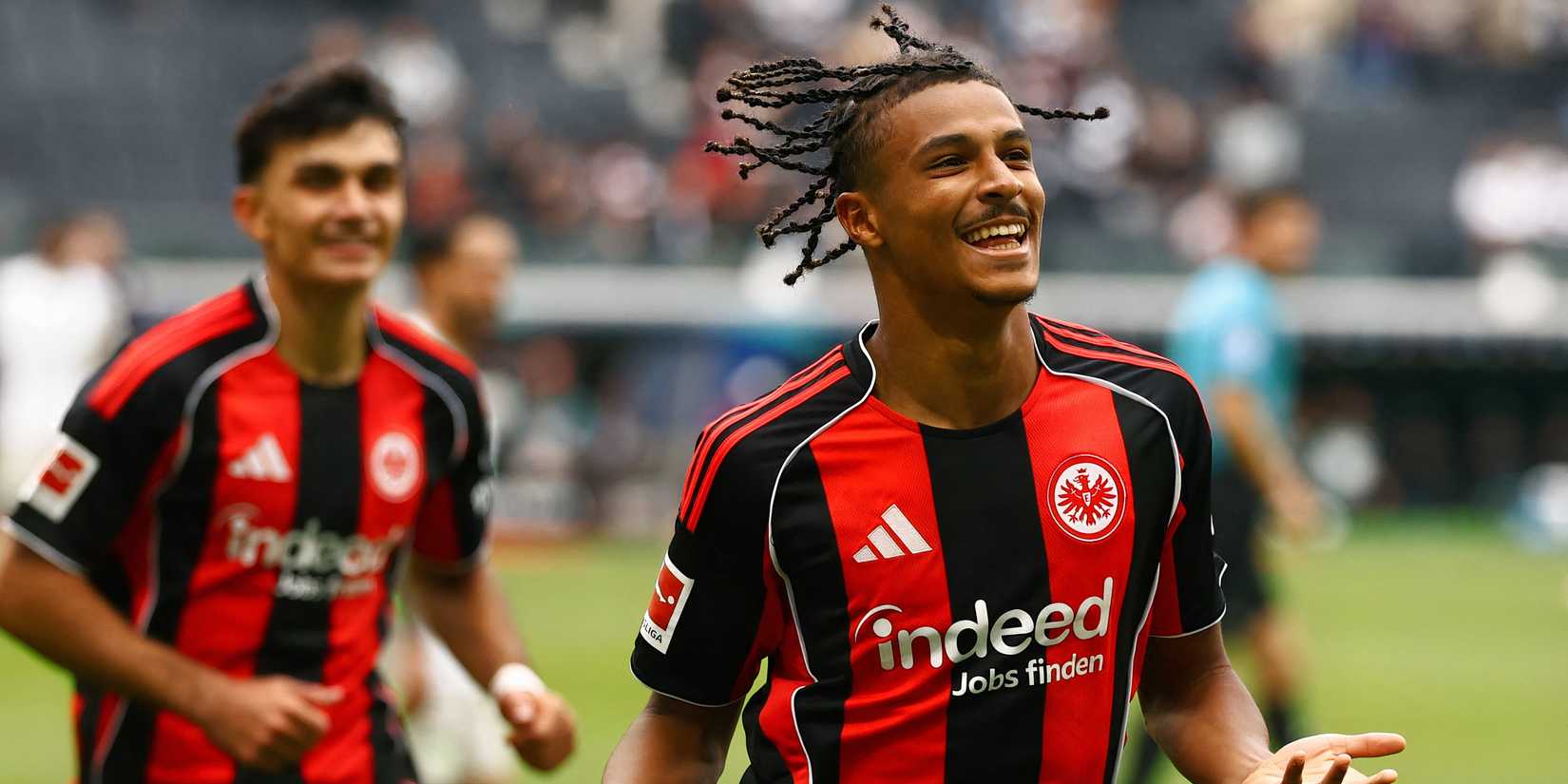 Jean-Mateo Bahoya celebrates scoring for Eintracht Frankfurt