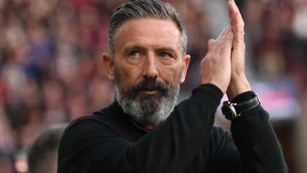 Derek McInnes claps the Hearts fans