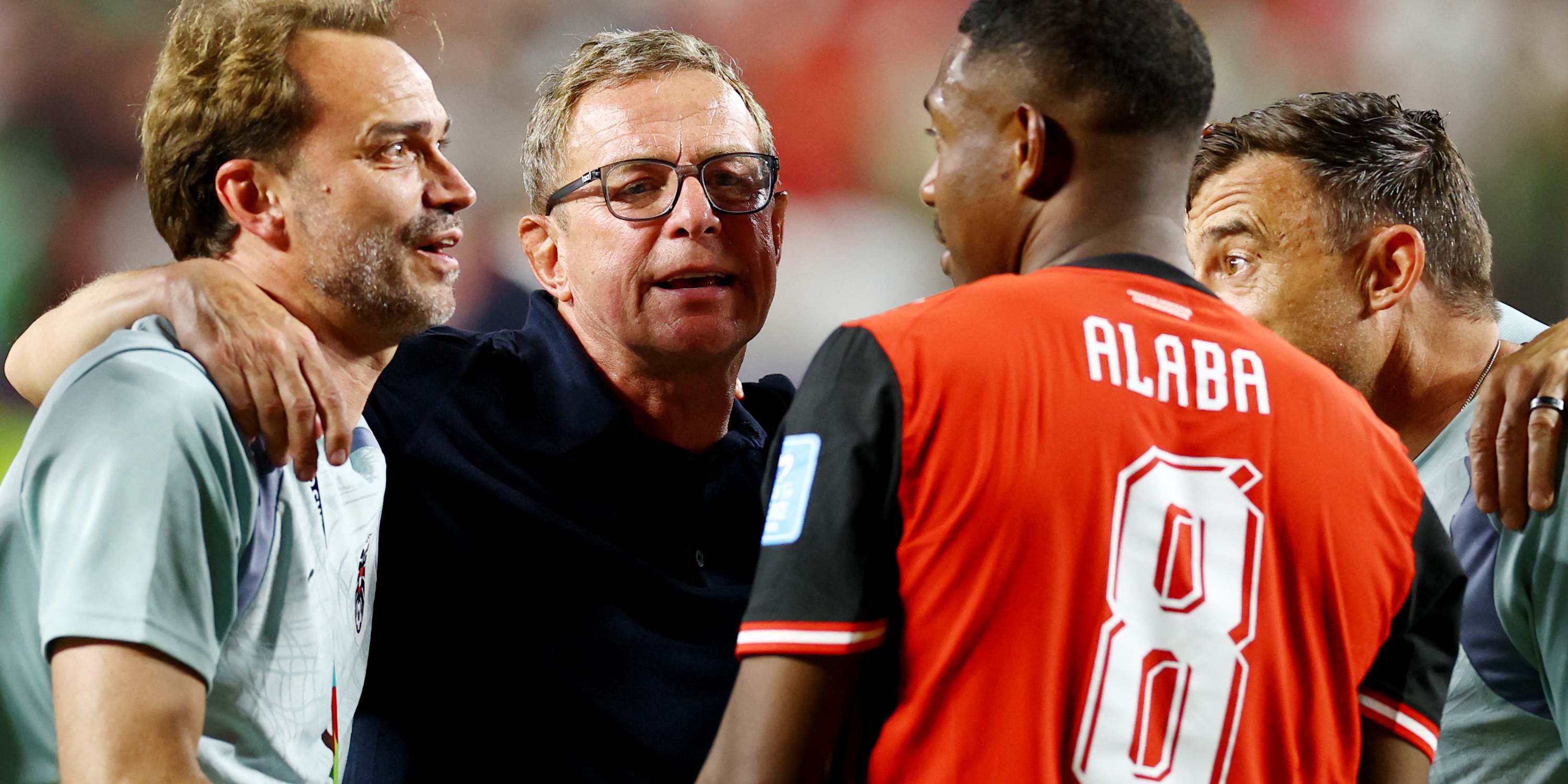 Ralf Rangnick and David Alaba (Austria) celebrate World Cup progress