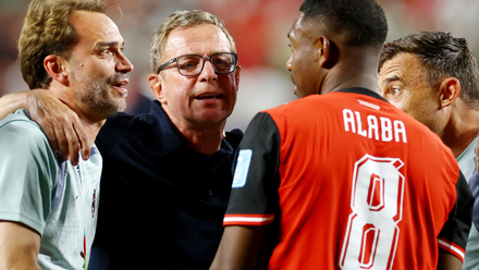 Ralf Rangnick and David Alaba (Austria) celebrate World Cup progress