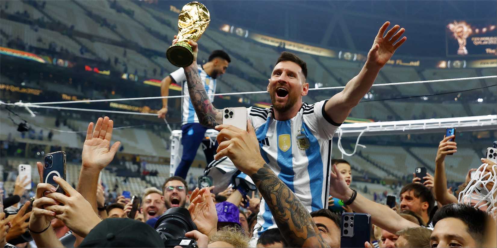 Lionel Messi celebrates winning the World Cup