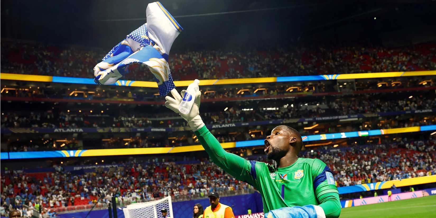 Lionel Mpasi of the DR Congo celebrates at the 2026 World Cup