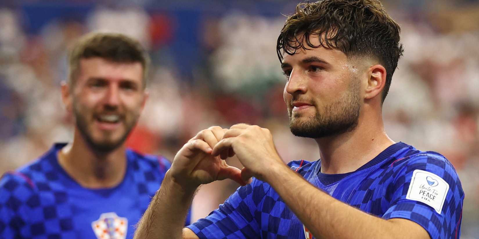 Martin Baturina celebrates scoring for Croatia vs England