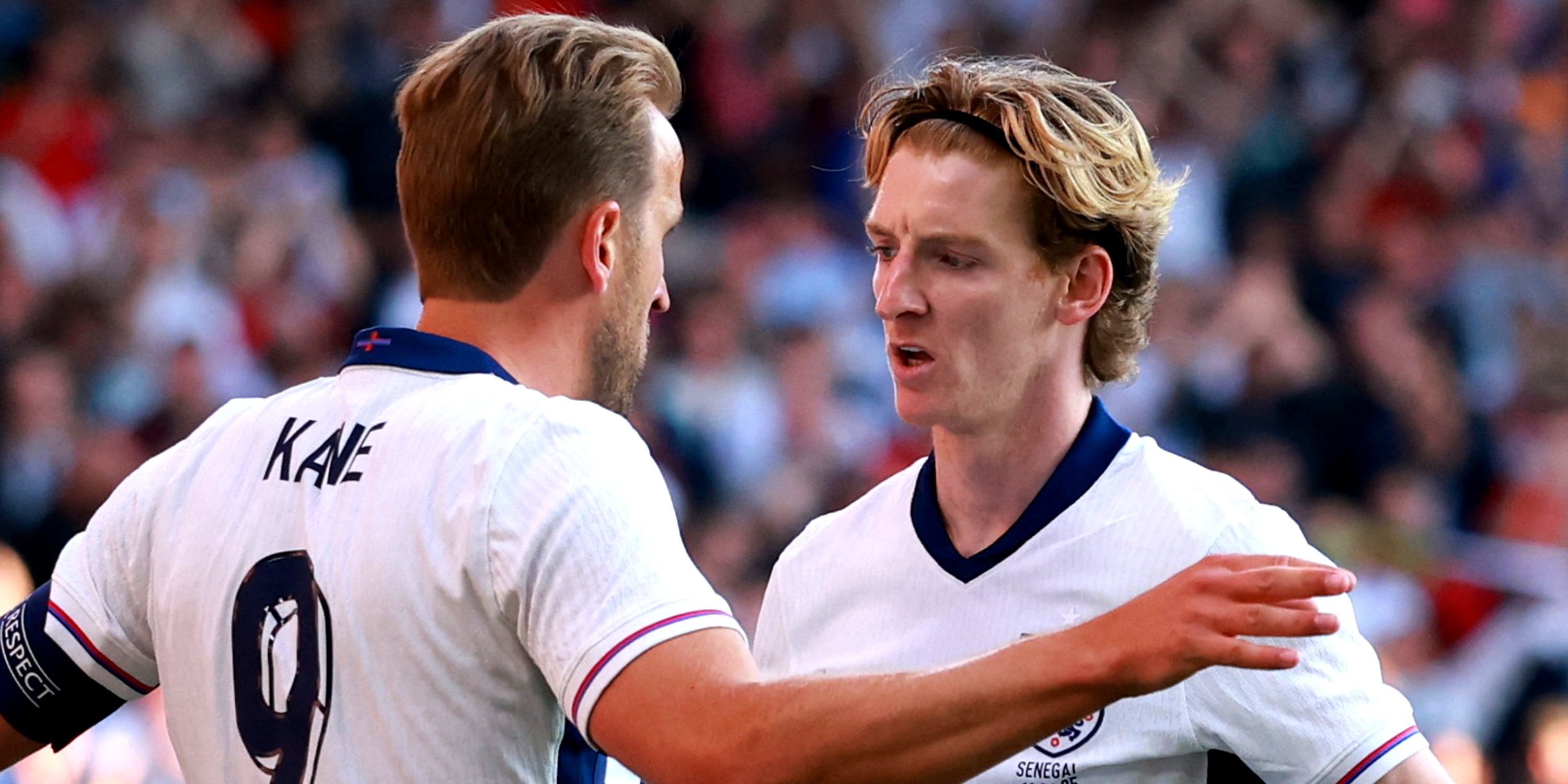 England's Harry Kane celebrates scoring a goal with Anthony Gordon