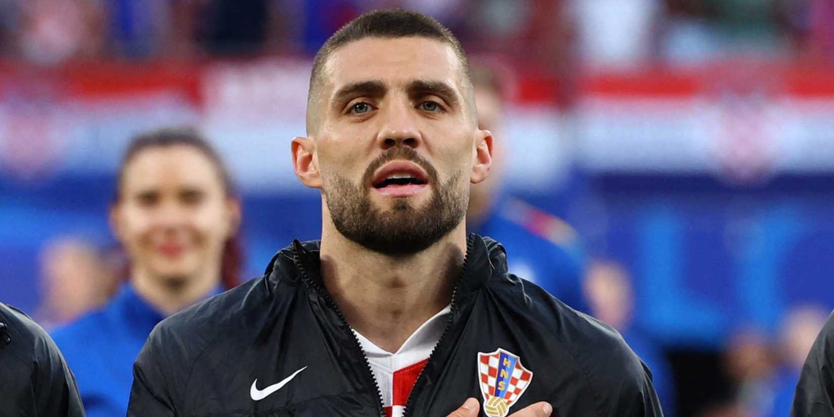 Croatia's Mateo Kovacic sings during the national anthem