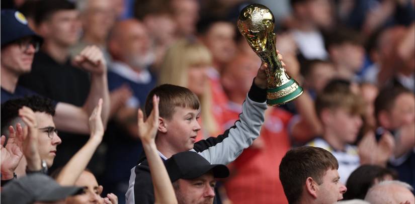 Scotland fans with World Cup trophy
