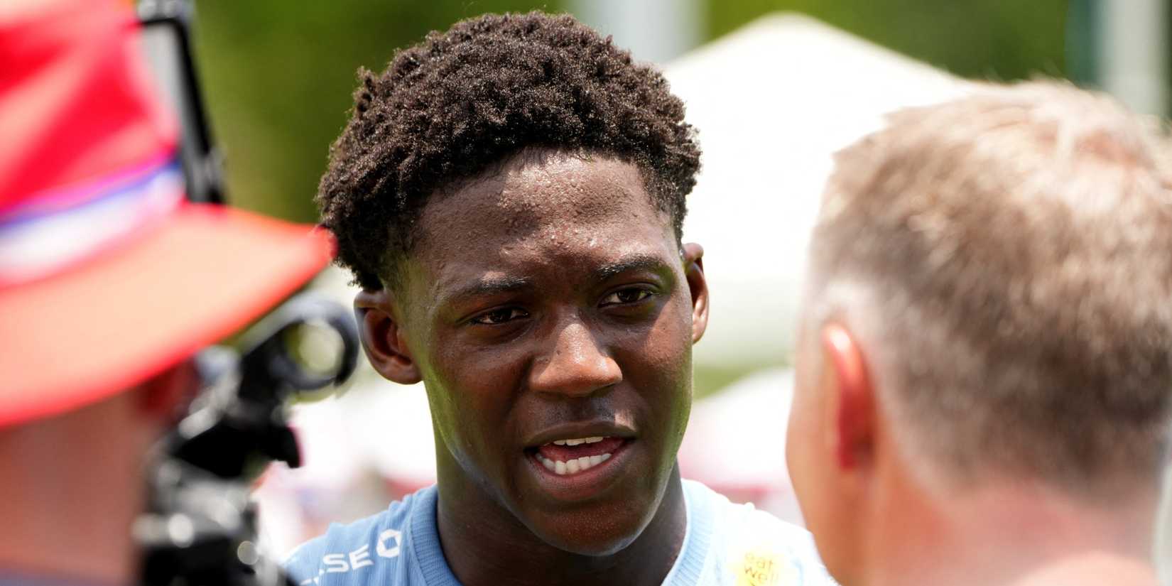England's Kobbie Mainoo speaks to media during a training camp