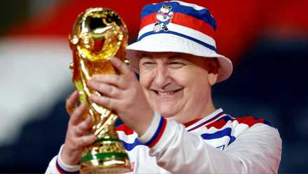 England fan with World Cup trophy
