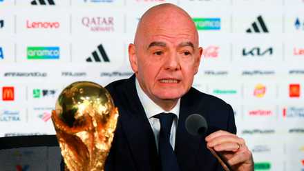 FIFA President Gianni Infantino with the FIFA World Cup trophy during a press conference
