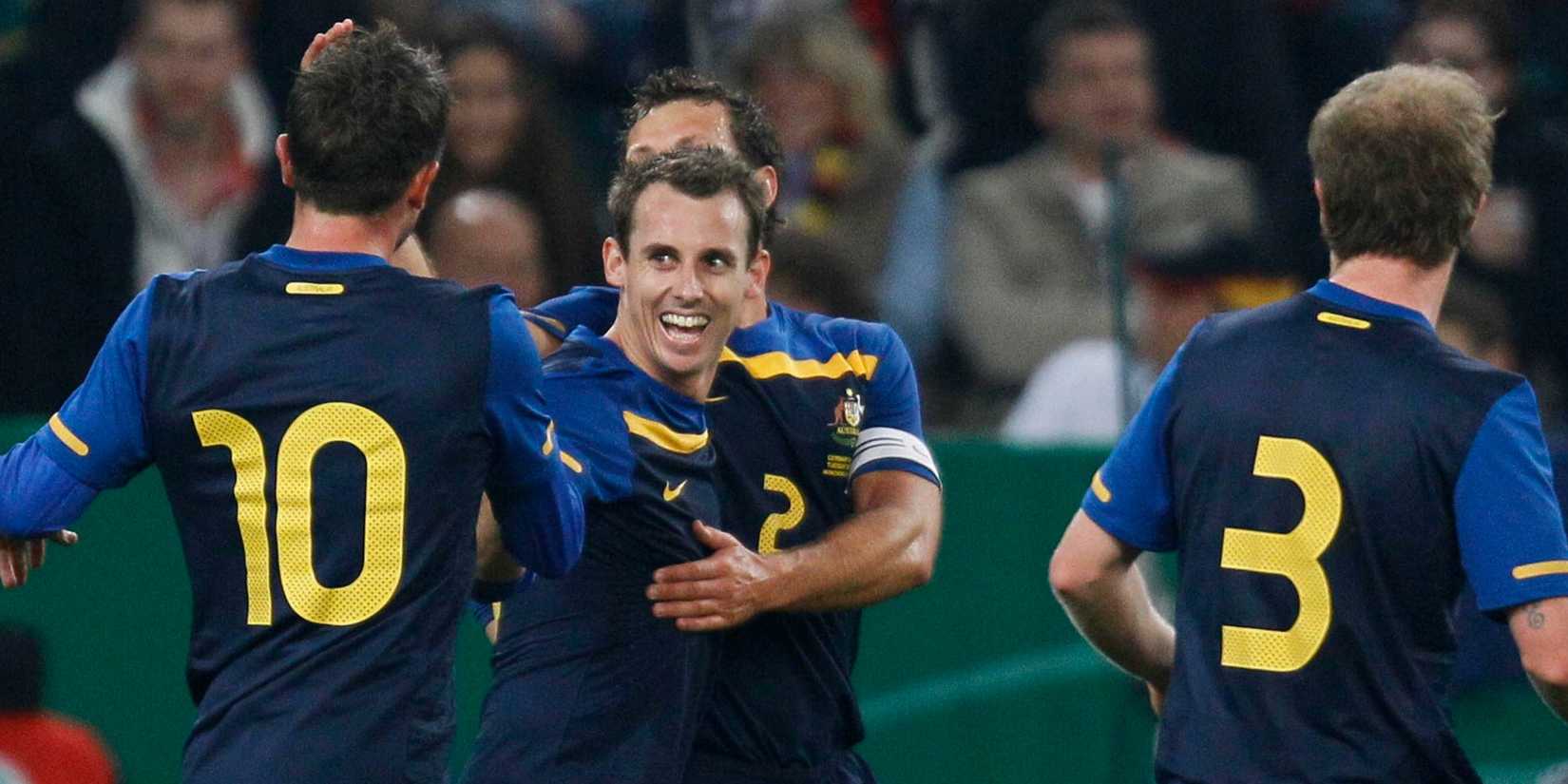 Luke Wilkshire celebrating a goal