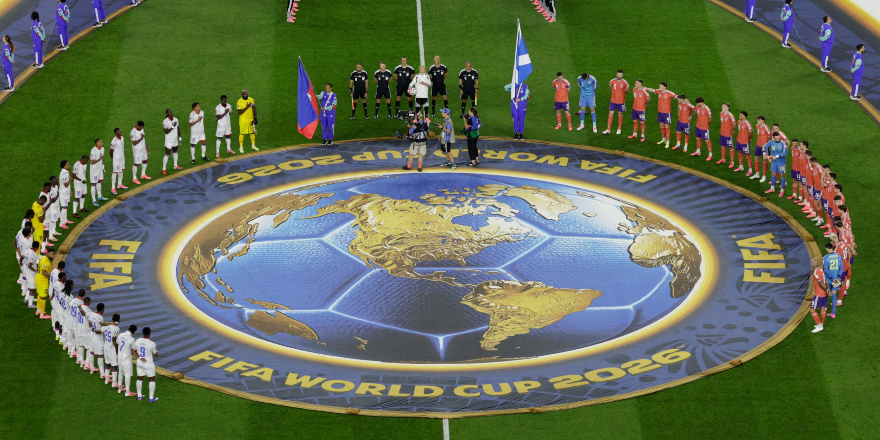 General view as players line up during the national anthems for Haiti vs Scotland