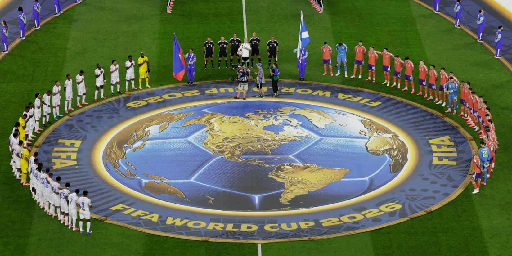 General view as players line up during the national anthems for Haiti vs Scotland