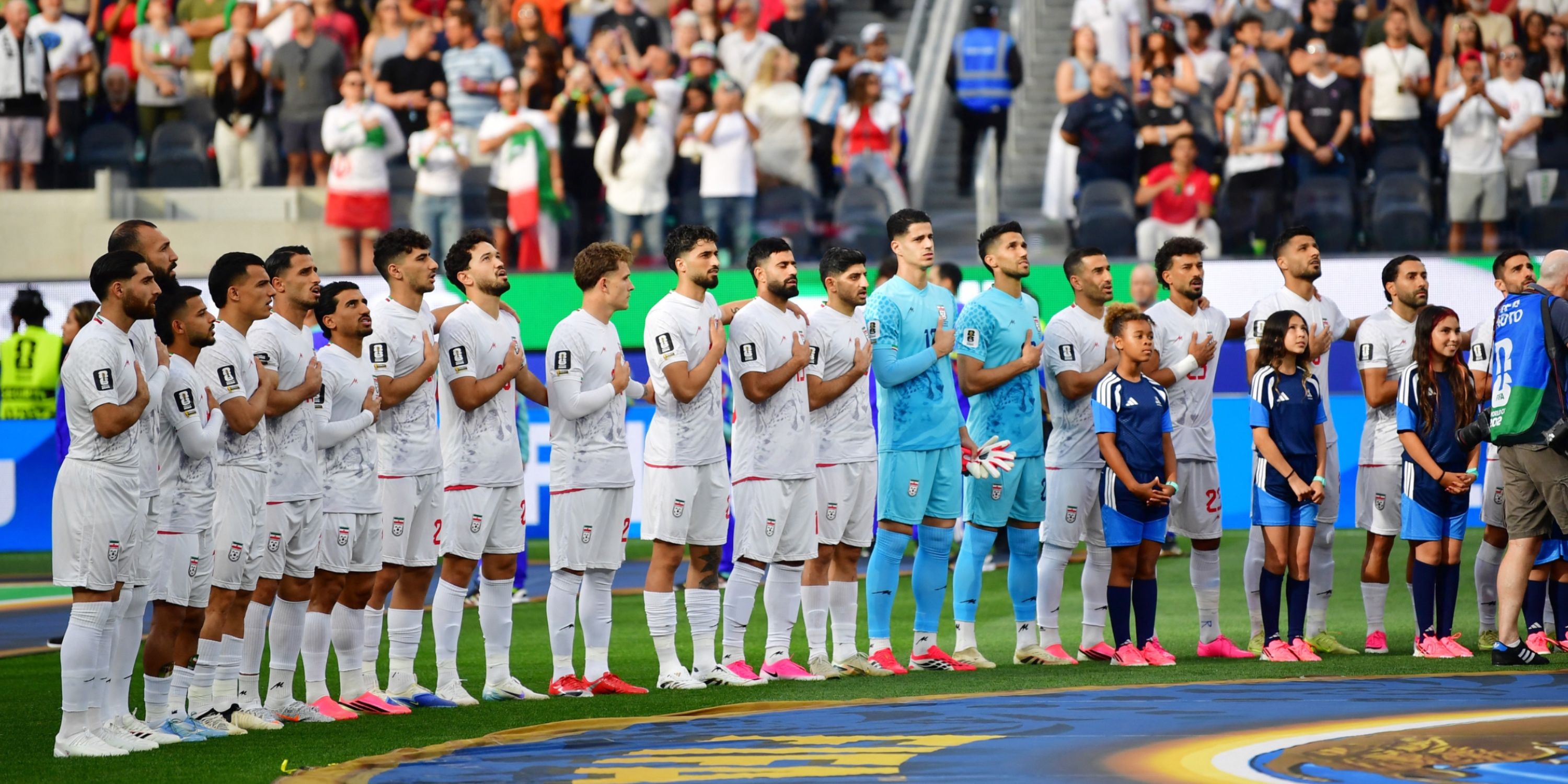 Iran sing national anthem