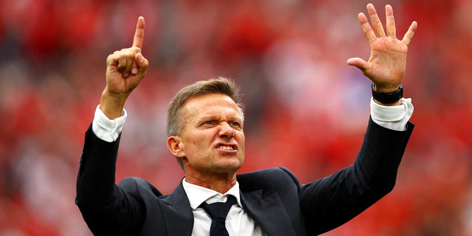 Canada coach Jesse Marsch signals six as he celebrates after the 6-0 World Cup win over Qatar