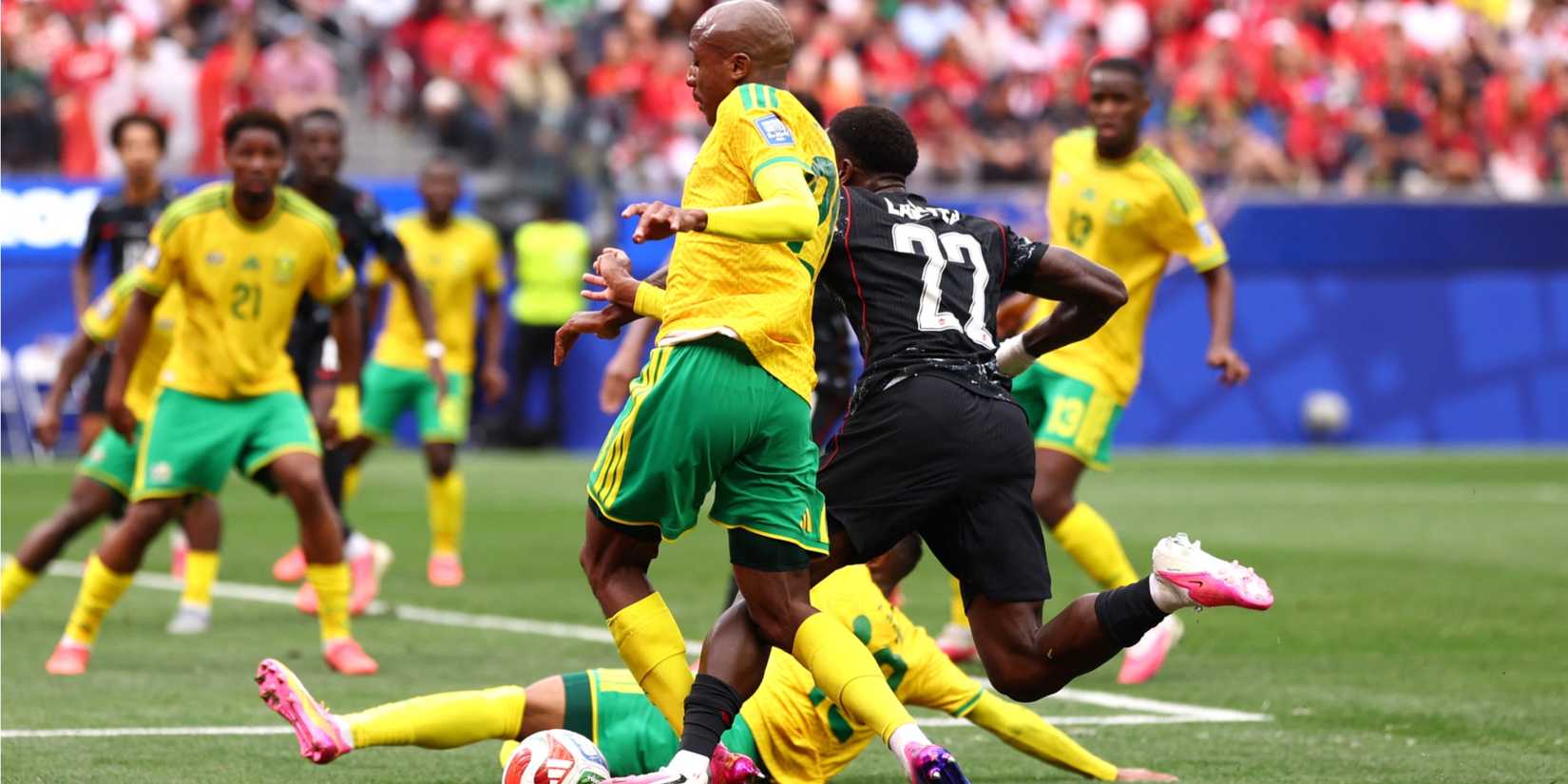 South Africa's Khuliso Mudau in action with Canada's Richie Laryea