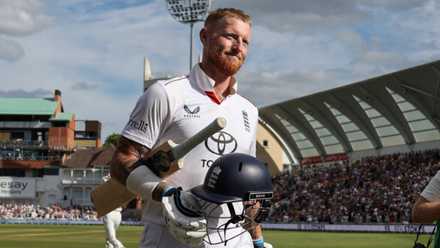 England's Ben Stokes walks back to the pavilion after losing his wicket off the bowling of New Zealand's Zak Foulkes