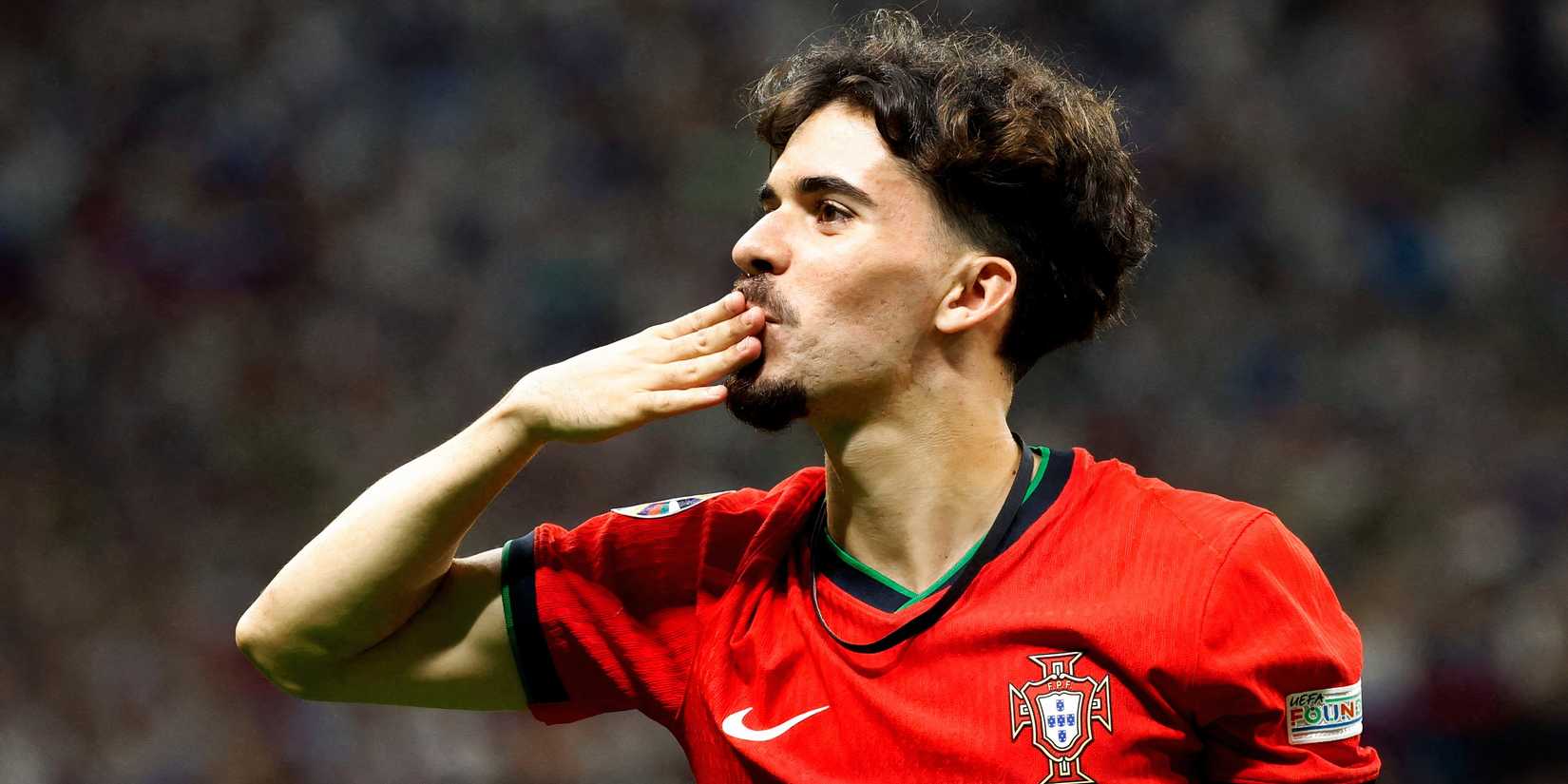 Vitinha celebrates scoring for Portugal