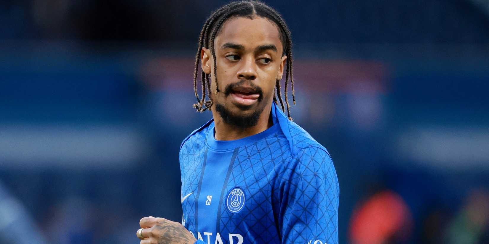Bradley Barcola warms up before Paris Saint-Germain match