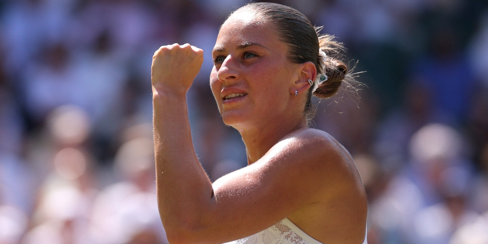 Ukraine's Marta Kostyuk reacts during her quarter final match against Italy's Jasmine Paolini
