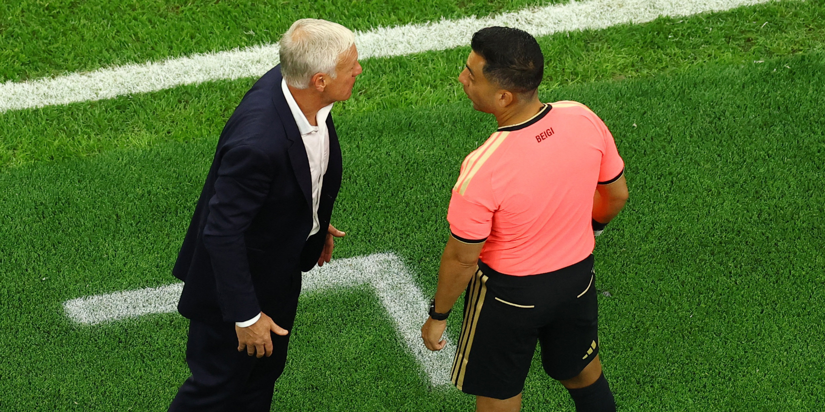 France coach Didier Deschamps remonstrates with referee Ivan Barton 