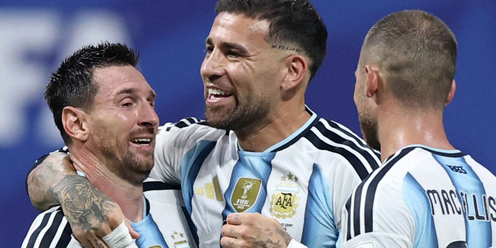 Argentina's Nicolas Otamendi and Lionel Messi celebrate after the match as Argentina qualify for the quarter finals of the World Cup