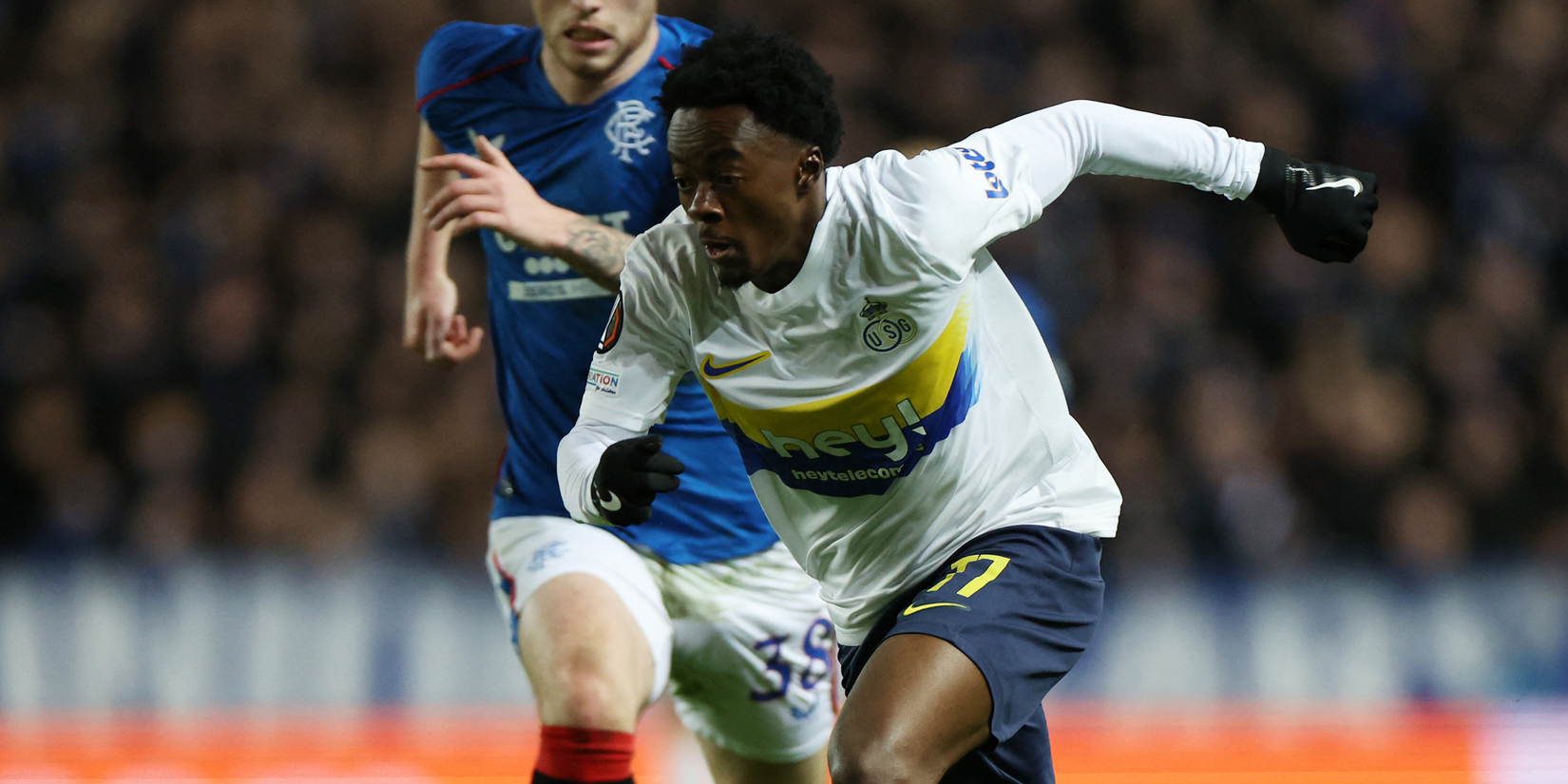Union Saint-Gilloise's Mohammed Fuseini in action with Rangers' Leon Thomson King 