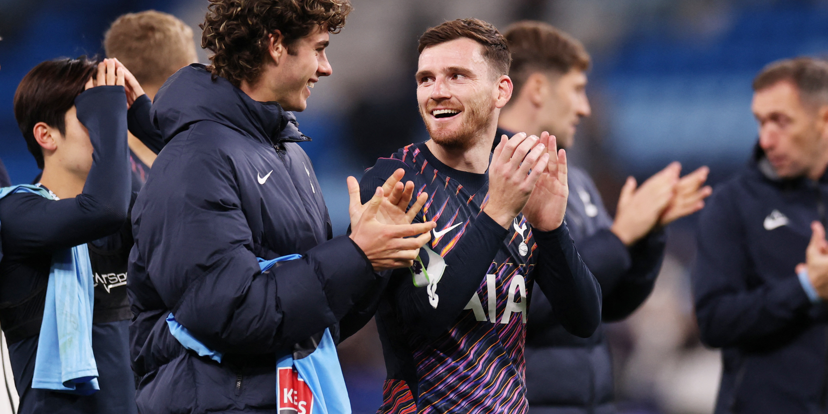  Tottenham Hotspur's Andy Robertson and Archie Gray applaud fans after the match 