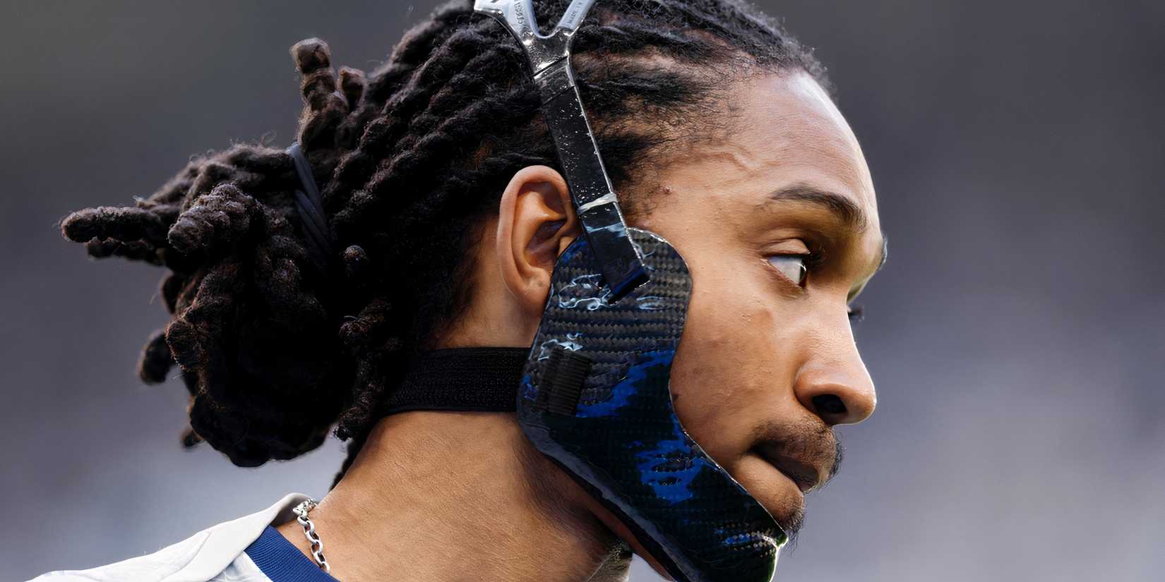 Djed Spence wearing a face mask