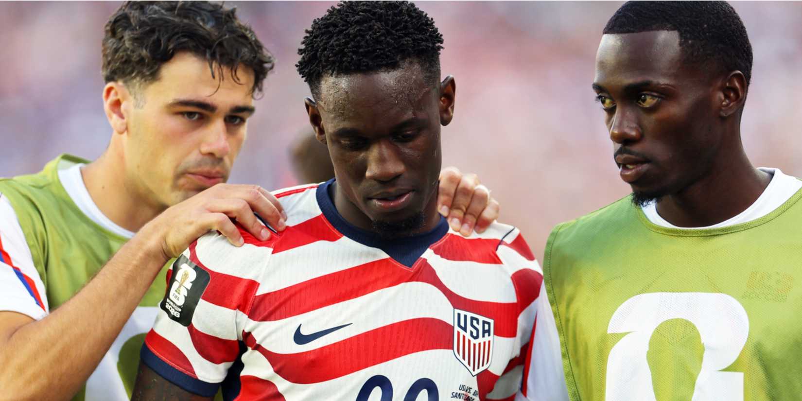 Folarin Balogun of the U.S. is consoled by Giovanni Reyna and Timothy Weah after receiving a red card