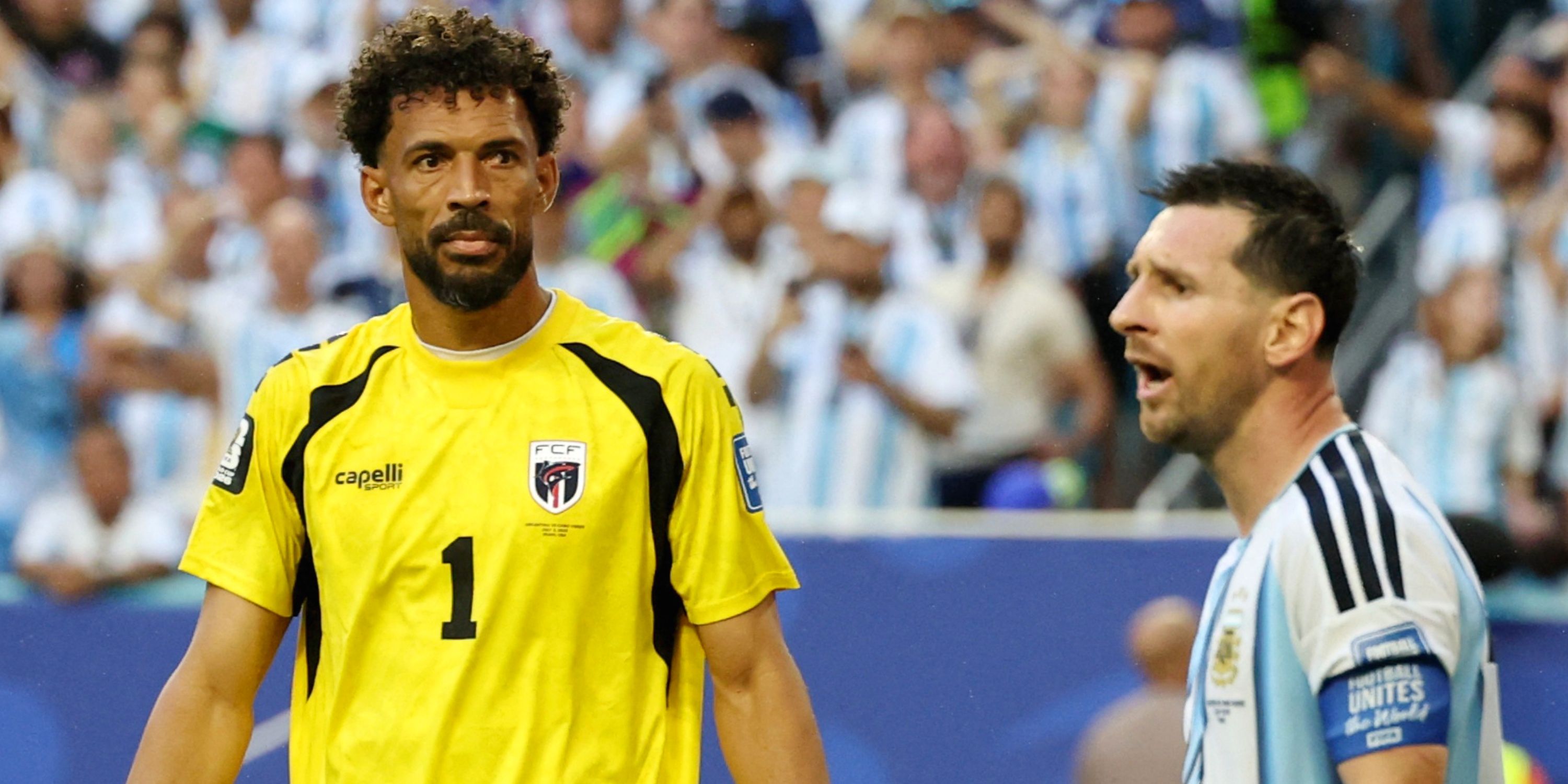Argentina's Lionel Messi reacts as Cape Verde's Vozinha looks on