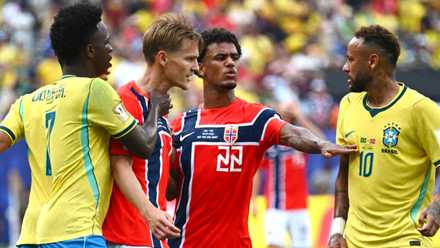 Norway's Martin Odegaard clashes with Brazil's Neymar Jr.